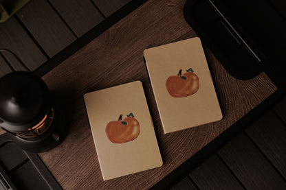 Notepad “Persimmon and Caterpillar” designed by Ava